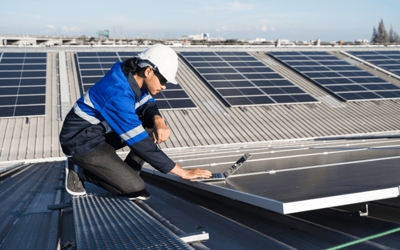expert working on solar panels
