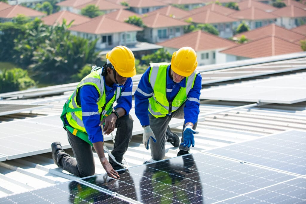 Solar Energy Contractors working on a commercial grid-tied solar system